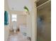 Bathroom with a tub, walk-in shower, and modern fixtures at 215 Australian Dr, Rotonda West, FL 33947