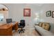 Home office with a comfortable sofa, perfect for working from home at 215 Australian Dr, Rotonda West, FL 33947