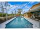 Private pool in screened enclosure, perfect for outdoor relaxation and entertaining at 215 Australian Dr, Rotonda West, FL 33947