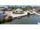 Breathtaking home featuring a boat lift, lush landscaping, and stunning water views at 2805 N Beach Rd # B, Englewood, FL 34223