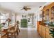 Dining area featuring a table, chairs, and built-in cabinets for ample storage at 2805 N Beach Rd # B, Englewood, FL 34223