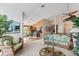 Spacious living room featuring an open floor plan, with views of dining and kitchen at 2805 N Beach Rd # B, Englewood, FL 34223