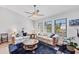 Bright living room with comfortable seating, ceiling fan, and plenty of natural light at 3522 Fox Ter, Port Charlotte, FL 33981