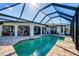 Relaxing pool area featuring an enclosed pool and patio area that's perfect for outdoor entertaining at 3522 Fox Ter, Port Charlotte, FL 33981