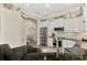 Bright kitchen featuring white cabinetry, stainless steel appliances, and granite counters at 1061 Boundary Blvd, Rotonda West, FL 33947