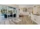Open concept living space seamlessly connects indoors and outdoors, showcasing the pool at 1061 Boundary Blvd, Rotonda West, FL 33947