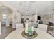 Bright, open living space with dining area and kitchen featuring modern finishes at 1061 Boundary Blvd, Rotonda West, FL 33947
