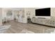 Spacious living area featuring a wine fridge and entertainment center at 1061 Boundary Blvd, Rotonda West, FL 33947