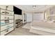 This main bedroom includes large wardrobe and shelving with a tray ceiling fan at 1061 Boundary Blvd, Rotonda West, FL 33947