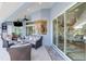 Relaxing patio with comfortable seating, scenic views, and seamless access to the interior at 1061 Boundary Blvd, Rotonda West, FL 33947