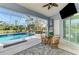 Resort-style pool and patio with a screened enclosure provides ample space for relaxing and entertaining at 1061 Boundary Blvd, Rotonda West, FL 33947