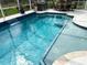 Inviting pool with spa and waterfall feature, perfect for relaxing and entertaining at 1061 Boundary Blvd, Rotonda West, FL 33947