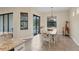Bright dining area with a view of the pool at 108 Wagon Place, Rotonda West, FL 33947