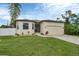 Beautiful single Gathering home with a two-car garage, a well maintained lawn, and updated features at 108 Wagon Place, Rotonda West, FL 33947