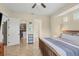 The spacious main bedroom offers a large walk-in closet and an ensuite bathroom at 108 Wagon Place, Rotonda West, FL 33947