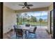 Relaxing screened-in patio with comfortable seating overlooking a private pool at 108 Wagon Place, Rotonda West, FL 33947