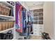 The well-organized walk-in closet has ample storage space and custom shelving at 108 Wagon Place, Rotonda West, FL 33947
