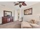 Inviting bedroom showcasing a comfortable chair and stylish furniture at 117 Cable Dr, Rotonda West, FL 33947