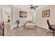 Comfortable bedroom featuring a ceiling fan, chair, and calming decor at 117 Cable Dr, Rotonda West, FL 33947