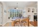 Dining area with natural lighting and a view of outdoor foliage at 117 Cable Dr, Rotonda West, FL 33947