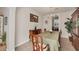 Formal dining room featuring classic decor, a chandelier, and ample seating at 117 Cable Dr, Rotonda West, FL 33947