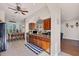 Charming kitchen and dining nook, open floor plan with light tile floor at 117 Cable Dr, Rotonda West, FL 33947