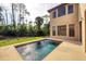 Inviting in-ground pool and patio area, perfect for outdoor relaxation and entertainment at 117 Cable Dr, Rotonda West, FL 33947