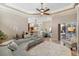 Open-concept living area with views of the kitchen, dining area, and outdoor pool at 13575 Chenille Dr, Port Charlotte, FL 33981