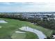 Stunning golf course view with coastline homes and sand traps on meticulously manicured greens at 6800 Placida Rd # 235, Englewood, FL 34224