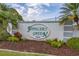 Welcome to Fiddler's Green, a beautiful community enhanced by lush landscaping and a charming entrance sign at 6800 Placida Rd # 235, Englewood, FL 34224