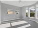 Well-lit bedroom with plenty of natural light and neutral carpet at 7180 Brittany Cir, Englewood, FL 34224