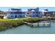 Beautiful waterfront coastal home with a private dock for boating, a luxurious waterfront lifestyle at 7180 Brittany Cir, Englewood, FL 34224