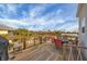 Outdoor living: spacious wooden deck with seating offers great views at 10451 Sherman St, Englewood, FL 34224