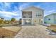 Coastal home featuring ample parking, a screened porch, and views at 10451 Sherman St, Englewood, FL 34224