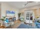 Cozy living room with comfortable seating, a decorative area rug, and natural light, creating a relaxing atmosphere at 10451 Sherman St, Englewood, FL 34224