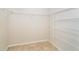 Walk-in closet with wire shelving for ample storage at 12650 Montigello Ct, Englewood, FL 34223