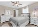 Bedroom with bed, ceiling fan, and closet space at 254 Mark Twain Ln, Rotonda West, FL 33947