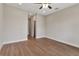 Bedroom with wood-look floors, ceiling fan, recessed lighting, and white trim at 2814 Vogler Ln, North Port, FL 34286