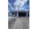 Charming single-story home featuring a two-car garage and modern design at 2814 Vogler Ln, North Port, FL 34286