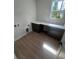 Laundry area featuring counter space, storage, and natural light at 2814 Vogler Ln, North Port, FL 34286