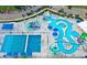 Aerial view of the community pool showcasing waterslides, recreational areas, and lap swimming at 2814 Vogler Ln, North Port, FL 34286