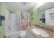 Full bathroom with a granite vanity top, step in shower, and decorative wall art at 3310 Loveland Blvd # 802, Punta Gorda, FL 33980