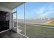 Serene view from screened lanai overlooking the lake at 3310 Loveland Blvd # 802, Punta Gorda, FL 33980