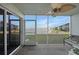 Screened-in lanai with view of the lake at 3310 Loveland Blvd # 802, Punta Gorda, FL 33980
