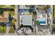 Overhead aerial view of fenced-in property featuring a patio with furniture and a white gravel yard at 539 Shore Rd, Nokomis, FL 34275