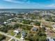 Discover a charming neighborhood with lush trees and a beautiful lake view at 7442 Clearwater St, Englewood, FL 34224