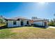 Attractive single-story home featuring a lovely front yard, and a convenient two-car garage at 7442 Clearwater St, Englewood, FL 34224