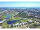 Stunning aerial shot of the residential neighborhood near the beautiful waterfront at 109 Westwind Dr, Placida, FL 33946
