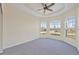 Bright bedroom with multiple large windows offering scenic views and natural light at 109 Westwind Dr, Placida, FL 33946