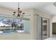 Dining area with pool view and sliding glass doors at 109 Westwind Dr, Placida, FL 33946